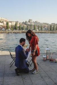 surprise wedding proposal at ribeira do porto with him on his knees